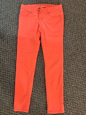 dELiA*s Coral Skinny Jeans